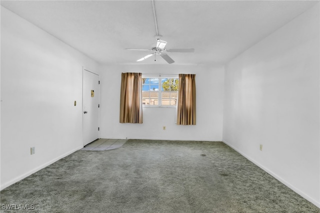 carpeted empty room with ceiling fan