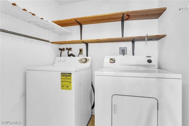 laundry room featuring independent washer and dryer