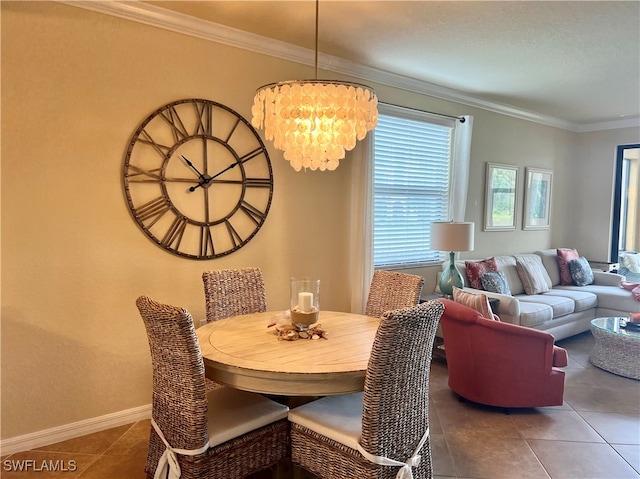 tiled dining area with an inviting chandelier and ornamental molding