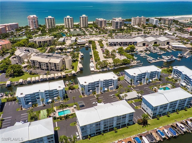 birds eye view of property featuring a water view