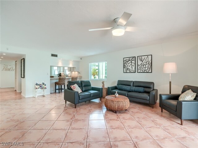 living room featuring ceiling fan