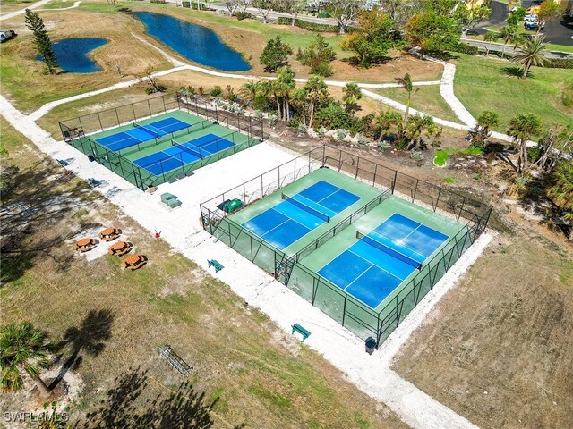 drone / aerial view with a water view