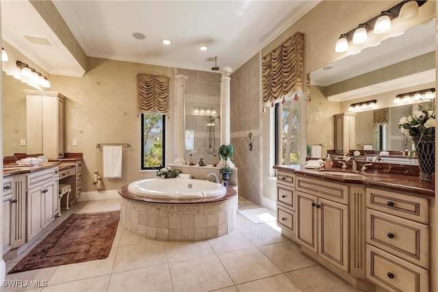 bathroom with tile patterned floors, separate shower and tub, crown molding, vanity, and ornate columns