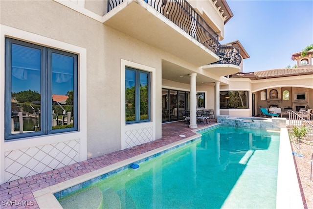 view of pool featuring a patio