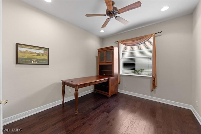 unfurnished office featuring recessed lighting, dark wood-style flooring, ceiling fan, and baseboards