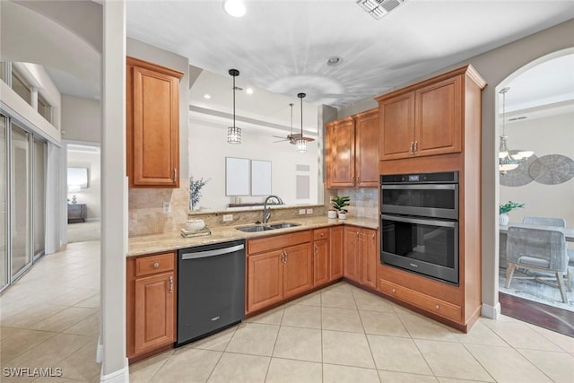 kitchen with light tile patterned floors, double oven, a sink, visible vents, and dishwasher