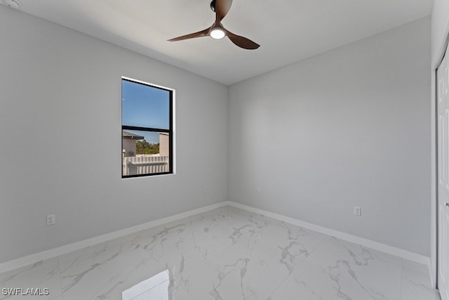 spare room featuring ceiling fan