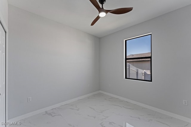 unfurnished room with ceiling fan