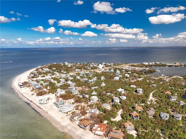 aerial view featuring a water view and a view of the beach