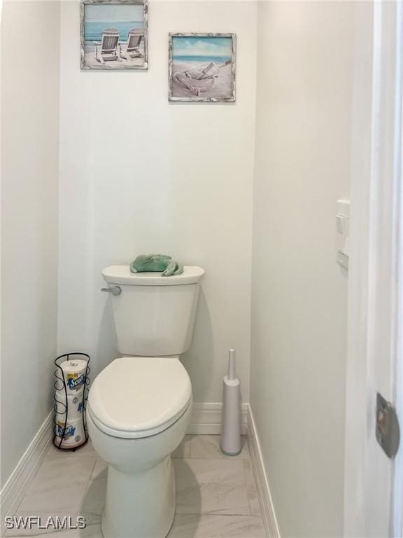 bathroom featuring toilet