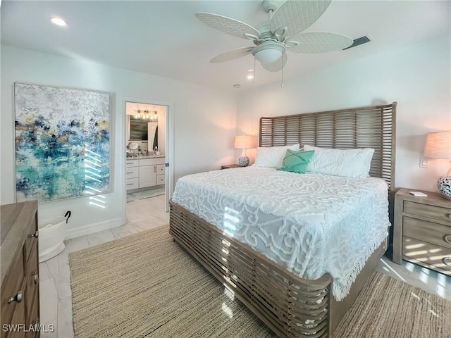 bedroom featuring ceiling fan and ensuite bathroom