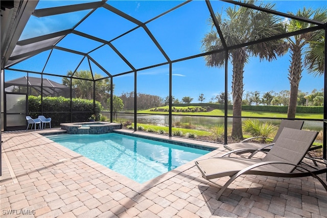 view of pool featuring a lanai, a patio area, an in ground hot tub, and a water view