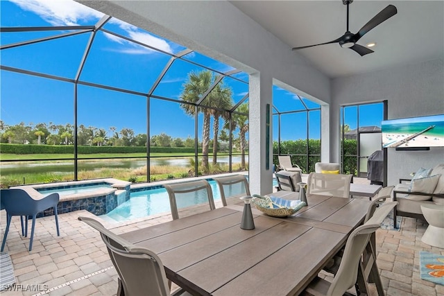 view of patio with an in ground hot tub and a lanai