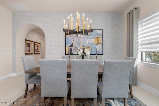 dining room featuring a chandelier