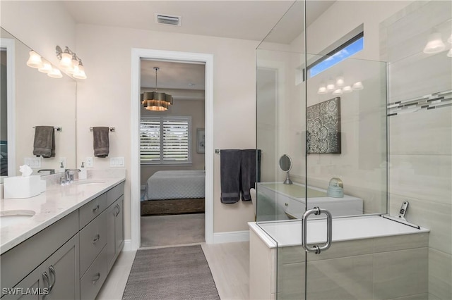 bathroom featuring vanity and walk in shower