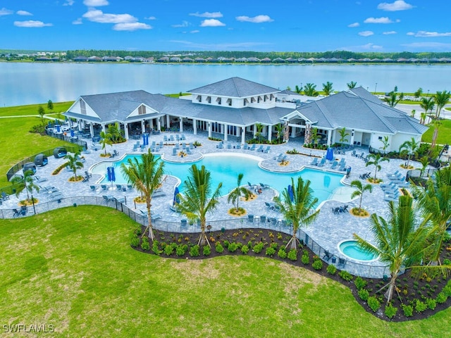 birds eye view of property featuring a water view