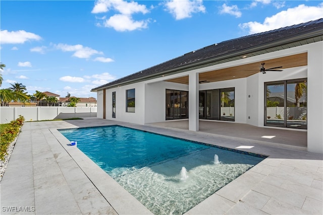 view of pool featuring a patio area and ceiling fan