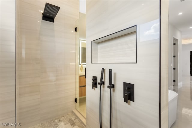 bathroom featuring shower with separate bathtub and vanity