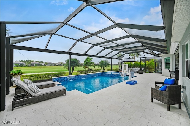 view of swimming pool featuring an outdoor hangout area, glass enclosure, and a patio area