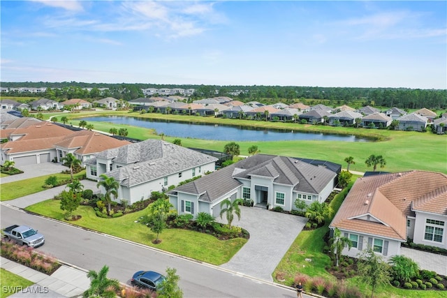 drone / aerial view with a water view