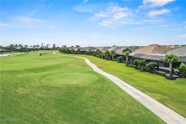 view of home's community with a lawn