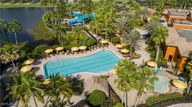 view of pool featuring a water view