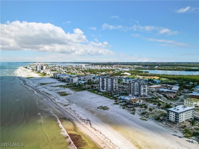 aerial view featuring a water view and a beach view