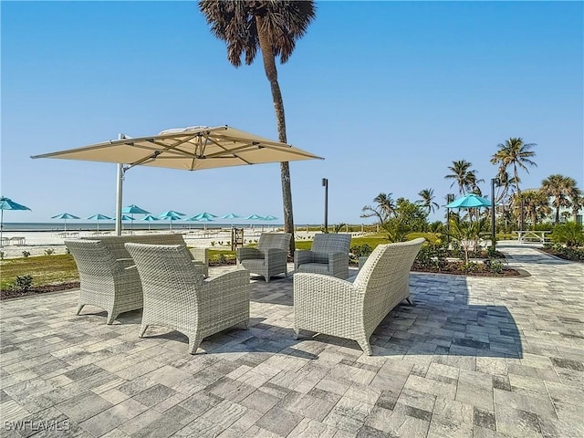 view of patio / terrace with a water view