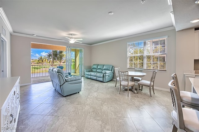 tiled living room with ceiling fan and crown molding