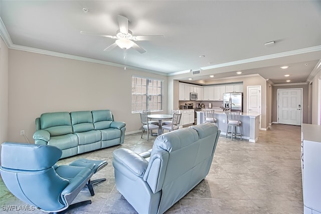 living room featuring ceiling fan and crown molding