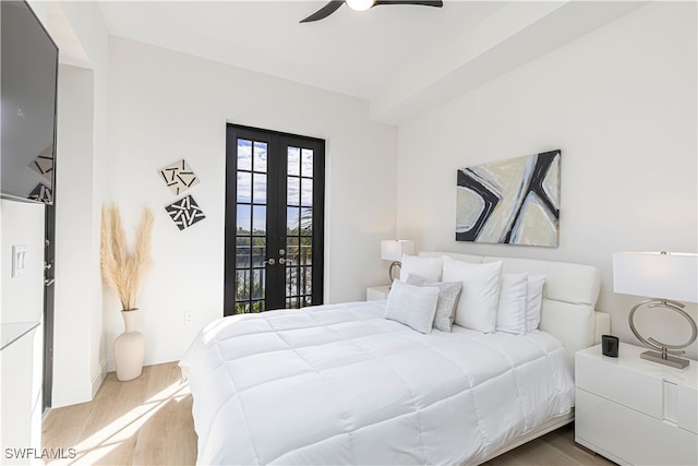 bedroom featuring access to exterior, french doors, light hardwood / wood-style flooring, and ceiling fan