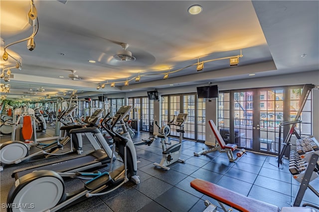 workout area featuring french doors and ceiling fan