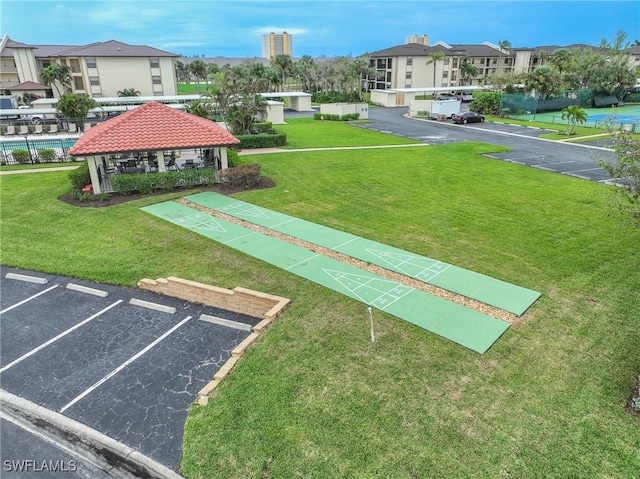 view of community with a gazebo and a lawn