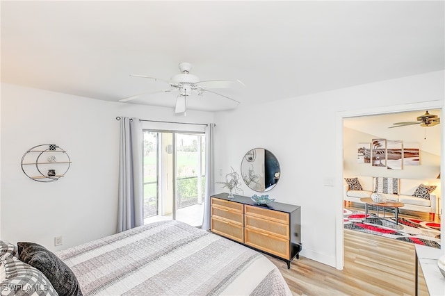 bedroom with access to exterior, light hardwood / wood-style flooring, and ceiling fan