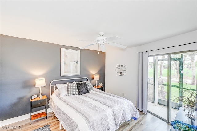 bedroom with hardwood / wood-style floors, ceiling fan, and access to outside