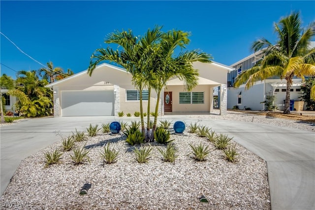 view of front of property featuring a garage