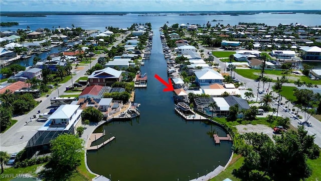 bird's eye view with a water view