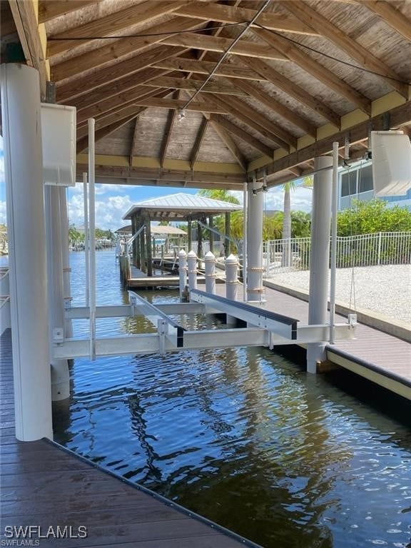 dock area featuring a water view