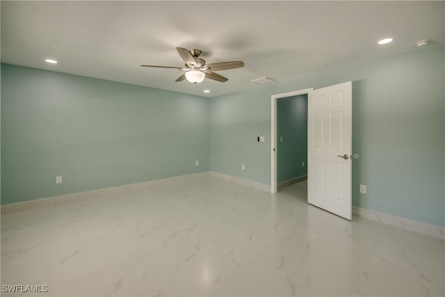 spare room featuring ceiling fan