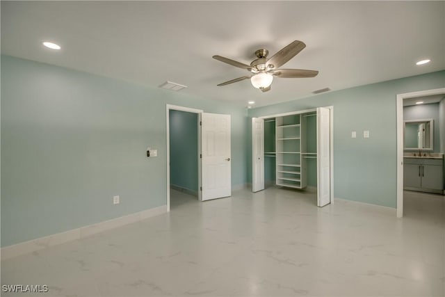 spare room with ceiling fan