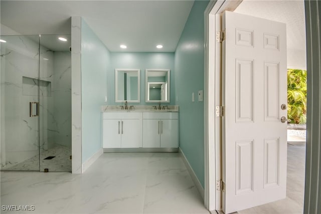 bathroom with vanity and walk in shower