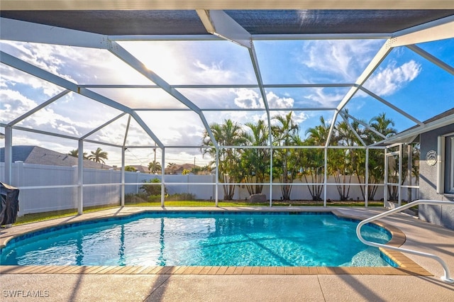 view of pool featuring a lanai and a patio