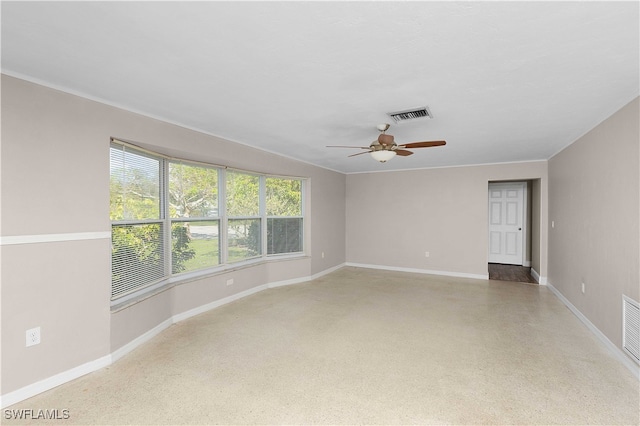 spare room with ceiling fan