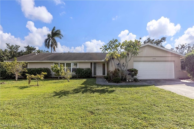 single story home featuring a front lawn and a garage