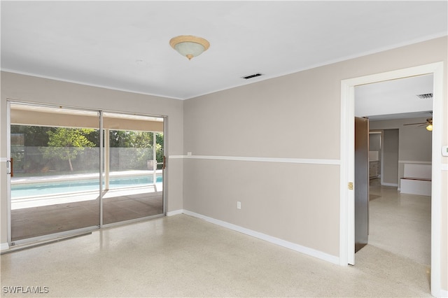 spare room featuring ceiling fan