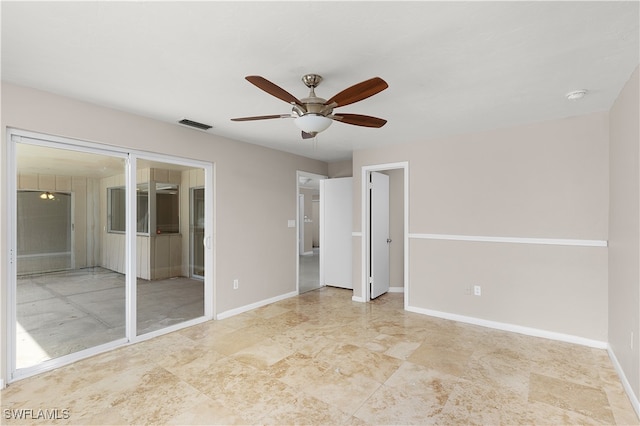 unfurnished bedroom featuring ceiling fan