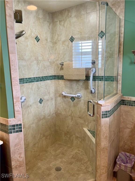 bathroom with an enclosed shower