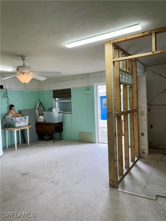 75 Friendship Ln, Englewood, FL 34223 - miscellaneous room with ceiling fan
