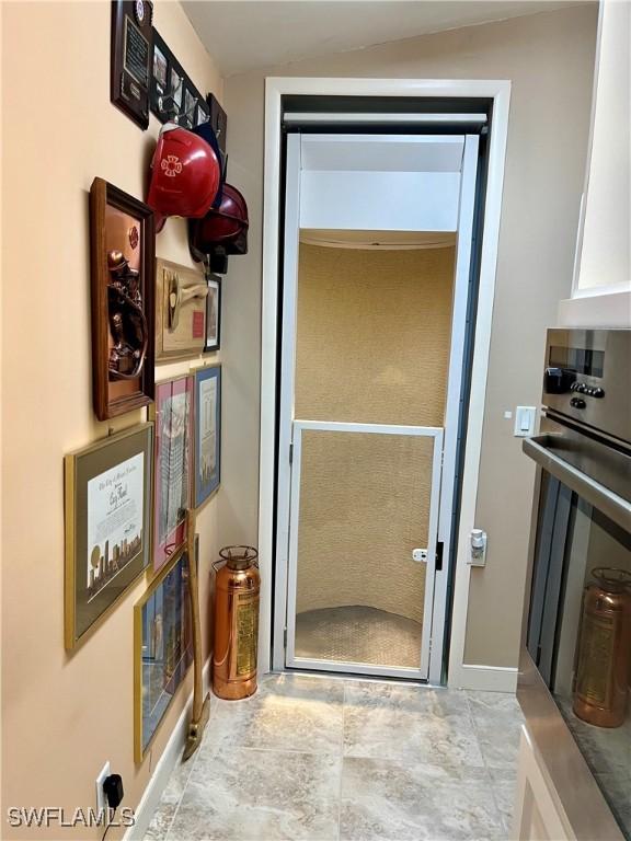 bathroom featuring vaulted ceiling