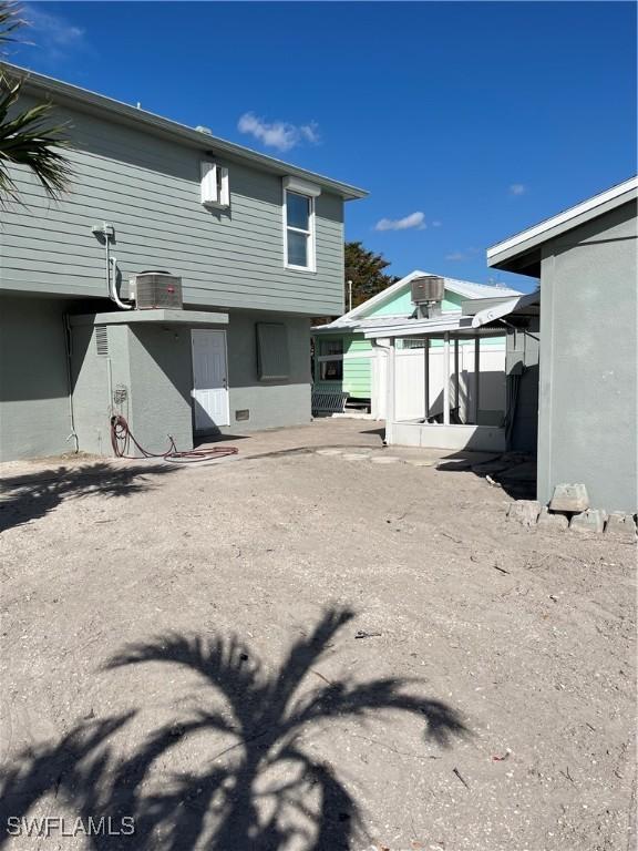 75 Friendship Ln, Englewood, FL 34223 - view of rear view of property